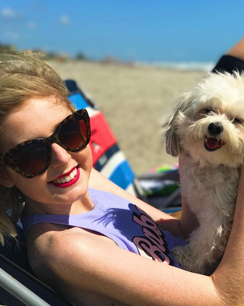 Annie McMahon at Rockaway Beach with dog